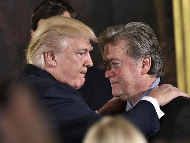 US President Donald Trump with Senior Counselor to the President Stephen Bannon during the swearing-in of senior staff in the East Room of the White House. Picture: AFP