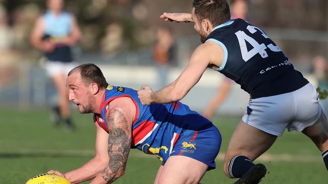 Southern Football League grand final 2019. Lindisfarne V Huonville at North Hobart Oval. Rhys Douglas Huonville and Kase Miller Lindisfarne. Picture: NIKKI DAVIS-JONES