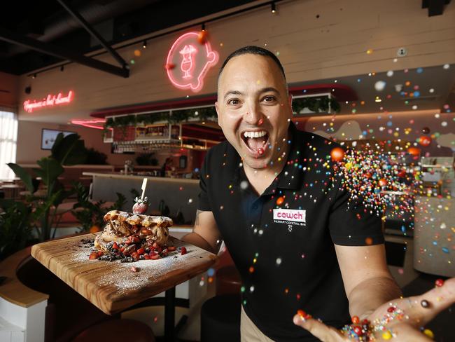 Owner of Cowch dessert bar Arif Memis posing at their new store at Westfield Chermside, Brisbane 25th of October 2019.  Arif has just opened his third store and has plans for franchises.  (AAP Image/Josh Woning)