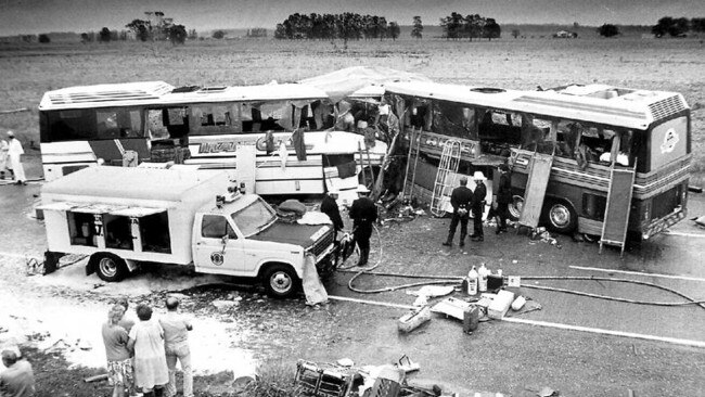 Police and rescue services on the scene of a bus crash that claimed 35 lives on the Pacific Highway at Clybucca, near Kempsey, in 1989.