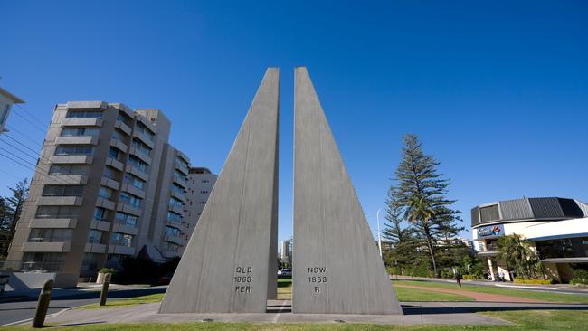 The border marker between two states Queensland and New South Wales, dividing twin cities Coolangatta and Tweed Heads.