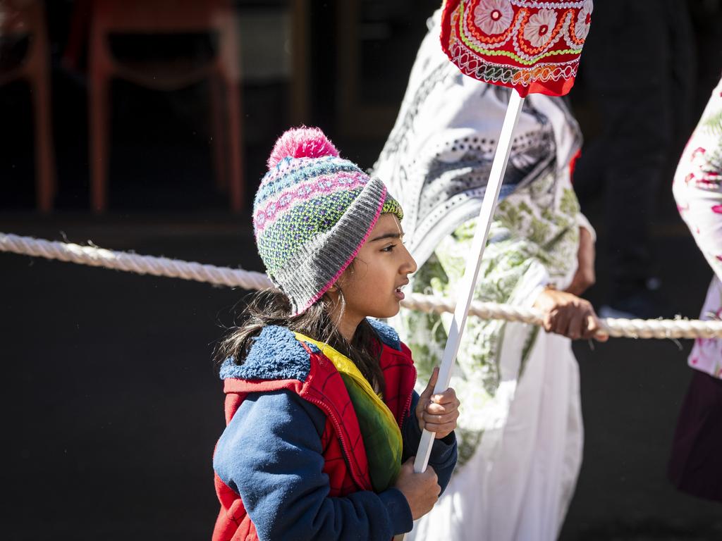 Antra Chaudhari walks between the chariot ropes as it is pulled along Neil St in Toowoomba's Festival of Chariots, Saturday, July 20, 2024. Picture: Kevin Farmer