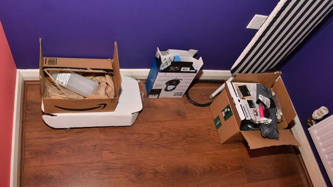 A bedroom floor scene with Amazon packaging and items belonging to Rudakubana. Picture: Merseyside Police/AFP