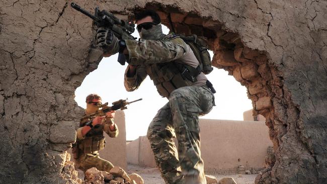 Special Operations Task Group soldiers at Multinational Base Tarin Kowt in Afghanistan, where some elite troops have been accused of committing acts of unsanctioned and illegal violence. Picture: Corporal Chris Moore.