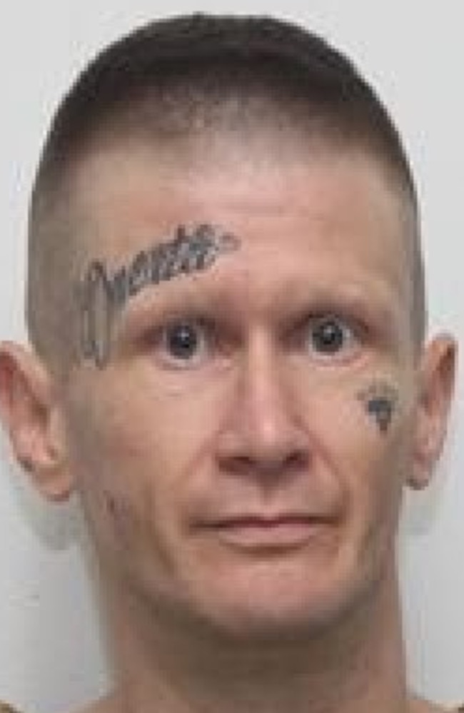 Daniel Ian Badcock has tattoos on his face. Picture: Queensland Police