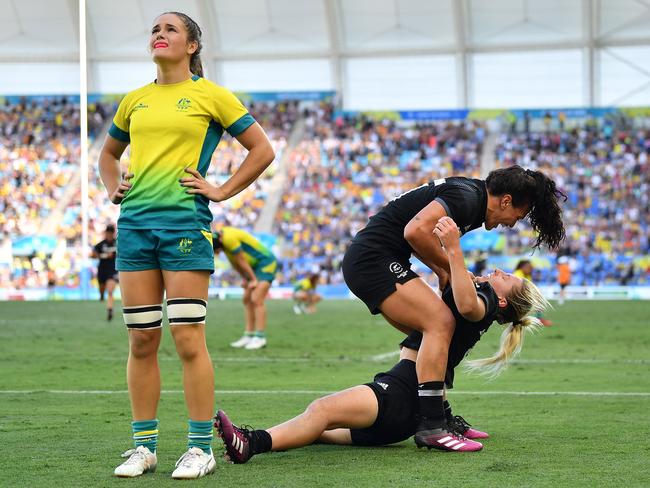 The Aussies were visibly heartbroken after New Zealand scored the winning try. Picture: Getty