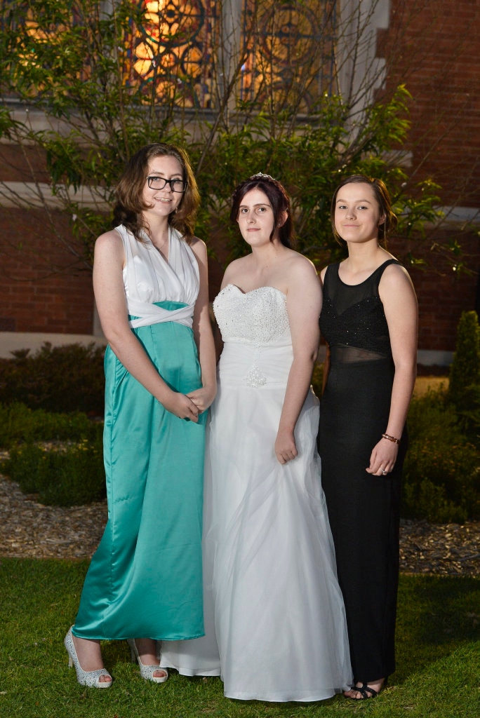 All dressed up for their formal are (from left) Emma Klein, Terri-Jane Kerr and Madison Thompson at Toowoomba Flexi School formal at Empire Theatres, Thursday, November 9, 2017. Picture: Kevin Farmer