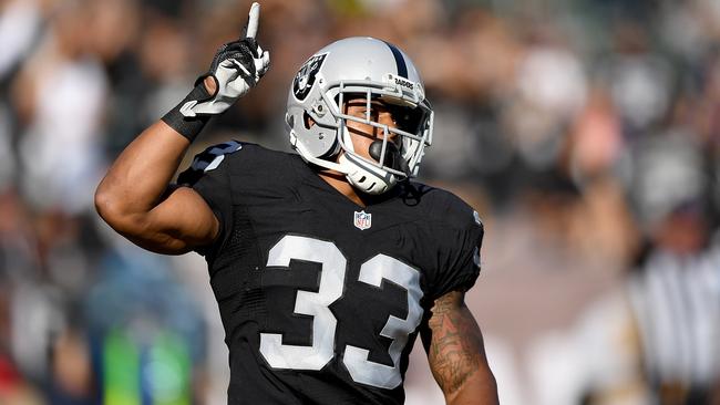 Running back DeAndre Washington of the Oakland Raiders celebrates.