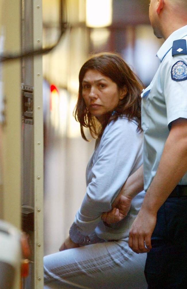 Roberta Williams is taken from the Supreme Court and led into a prison van.