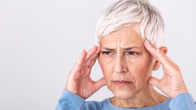 MENTAL HEALTH -  Woman suffering from stress or a headache grimacing in pain. Senior woman with migraine feeling unwell. Portrait of an attractive senior woman with a headache, feeling pain Picture: Istock