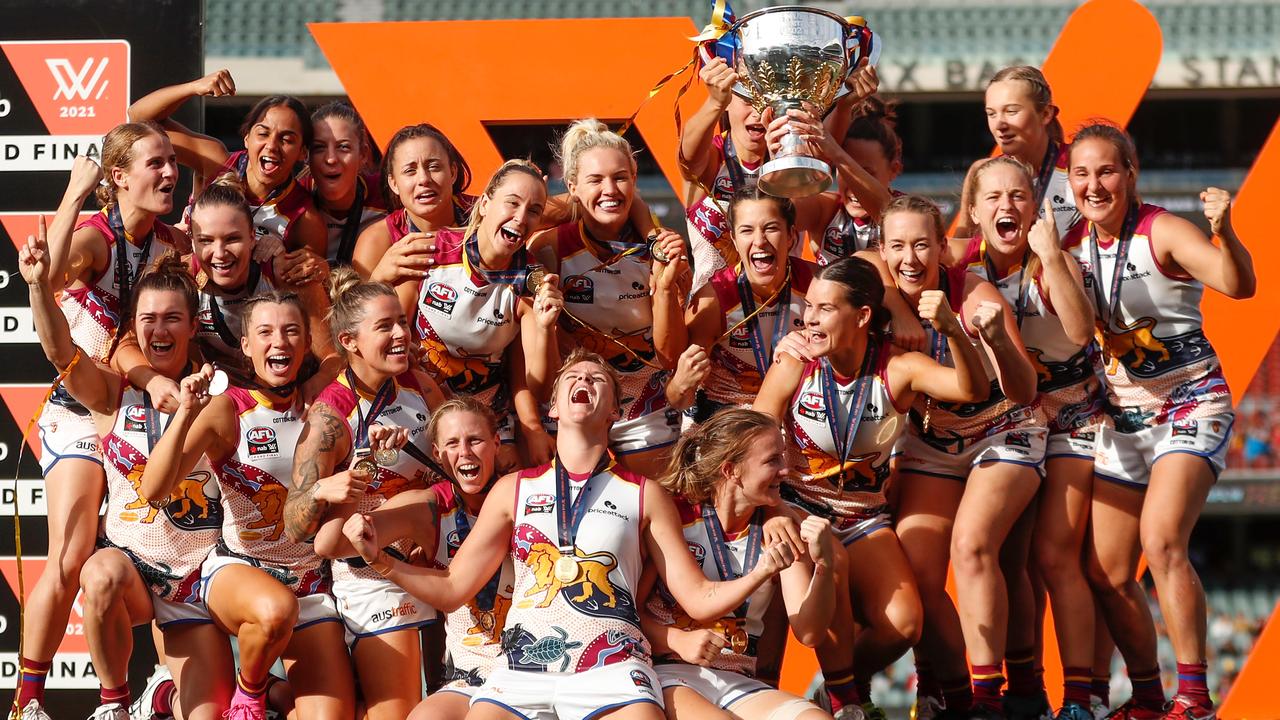 ADELAIDE, AUSTRALIA - APRIL 17: Lions players celebrate after winning the 2021 AFLW Grand Final match between the Adelaide Crows and the Brisbane Lions at Adelaide Oval on April 17, 2021 in Adelaide, Australia. (Photo by Michael Willson/AFL Photos via Getty Images)