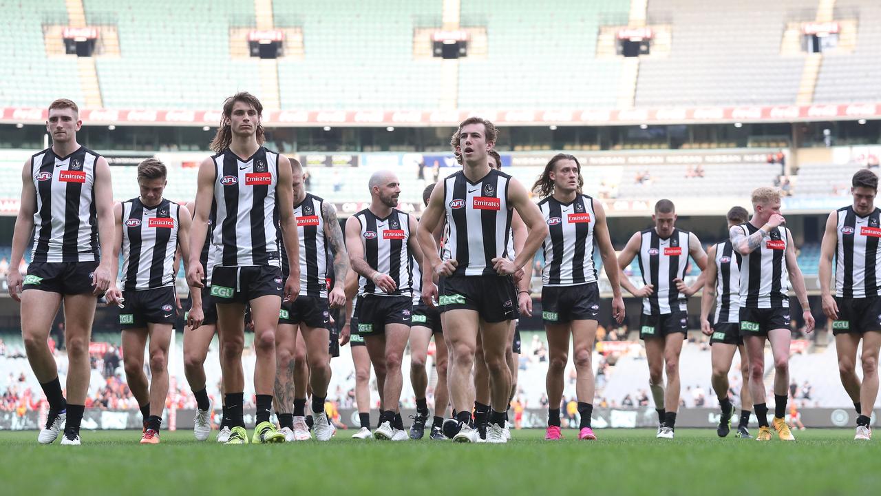 Disappointed Magpies walk off the MCG. Picture: Michael Klein
