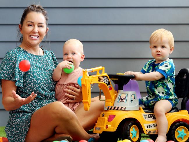 Owner Cassandra Bourke with Evie Dignam, 14 months, and Ivar Thompson, 11 months, at Goodlife Kindergarten and Child Care in Park Ridge. Picture: Tara Croser