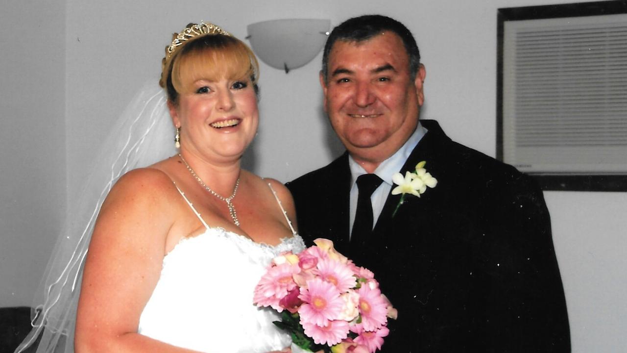 John Griffiths with daughter Kylie Underwood on her wedding day. Kylie wants her father’s body released from the state coroner’s so she can lay him to rest.