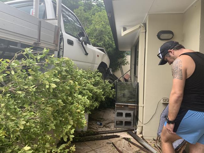 Lee Hayes inspects the damage to his property following the crash. Picture: Peter Wallis