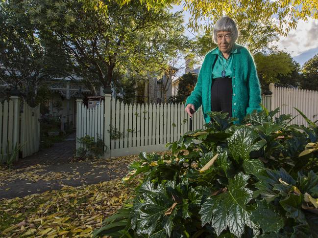 Nature Strip wars in Hawthorn. Boroondara Council has sent a removal notice to a couple who have had flowers on their nature strip since 1994. Yet, just up the road, they are quite happy to let an overgrown and unkempt nature strip grow. Gwen McWilliam and  by the `offending' plants on the nature strip. Picture: Valeriu Campan