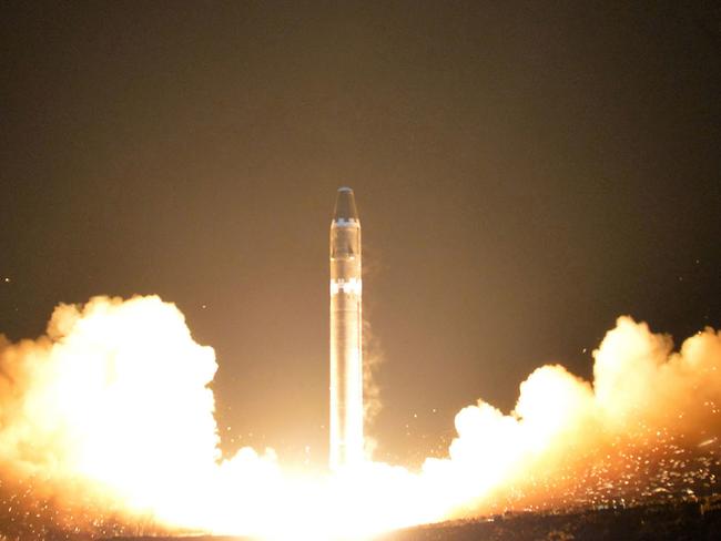 FILE - This Nov. 29, 2017, file image provided by the North Korean government shows what the North Korean government calls the Hwasong-15 intercontinental ballistic missile, at an undisclosed location in North Korea. Japanâ€™s Cabinet approved a plan Tuesday, Dec. 19, 2017, to purchase a set of costly land-based missile combat system from the U.S. to step up Japanese missile defense capability amid escalating threat from North Korea. The decision would allow the Defense Ministry to buy a set of two Aegis Ashore systems to add to Japanâ€™s current two-step missile defense consisting of Patriot batteries and Aegis-equipped destroyers. Independent journalists were not given access to cover the event depicted in this image distributed by the North Korean government. The content of this image is as provided and cannot be independently verified. Korean language watermark on image as provided by source reads: "KCNA" which is the abbreviation for Korean Central News Agency. (Korean Central News Agency/Korea News Service via AP)