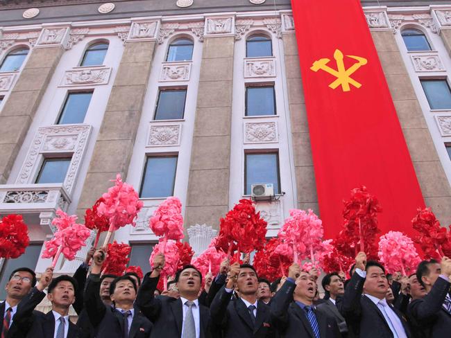 North Koreans take part in an event marking the 20th anniversary of the election of former leader Kim Jong-il as general secretary of the Workers'’ Party, which is the founding and ruling party of North Korea. Picture: Jon Chol Jin/AP