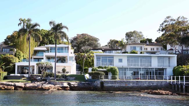 The properties overlook Sydney Harbour.