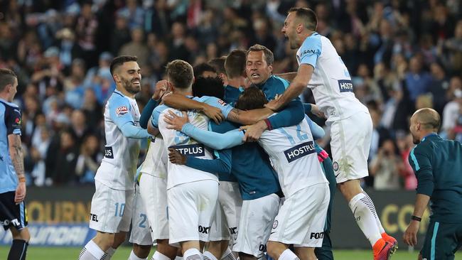 Melbourne City celebrate after they defeated Sydney FC.