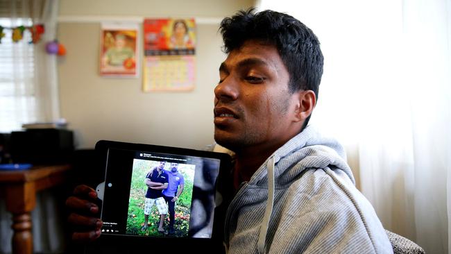 Jisi Navarathinam mourns his brother , Ajanthan Navarathinam, (pictured with Jisi(left), on right on tablet device) after Ajanthan brought Heat Beads into the house after a barbecue, and consequently died in his sleep from Carbon Monoxide poisoning .