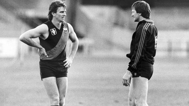 Merv Neagle with coach Kevin Sheedy during Essendon training in 1983.