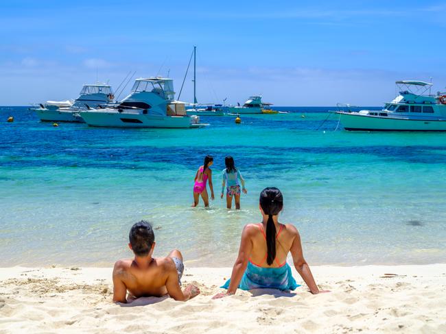 Family swimming at Longreach Bay, Rottnest Island