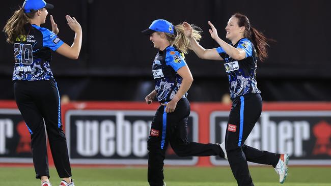 SYDNEY, AUSTRALIA - NOVEMBER 20: Megan Schutt of the Strikers celebrates the wicket of Hannah Darlington of Thunder during the Women's Big Bash League match between the Sydney Thunder and the Adelaide Strikers at North Sydney Oval, on November 20, 2022, in Sydney, Australia. (Photo by Mark Evans/Getty Images)