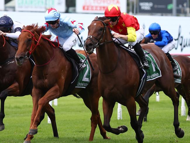 SYDNEY, AUSTRALIA - FEBRUARY 17: James Mcdonald riding King Of Sparta wins Race 5 James Squire Expressway Stakes during "Apollo Stakes Day" - Sydney Racing at Royal Randwick Racecourse on February 17, 2024 in Sydney, Australia. (Photo by Jeremy Ng/Getty Images)