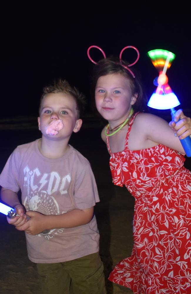 Jack and Charlie celebrating New Year's Eve 2022 at Mooloolaba. Photo: Elizabeth Neil