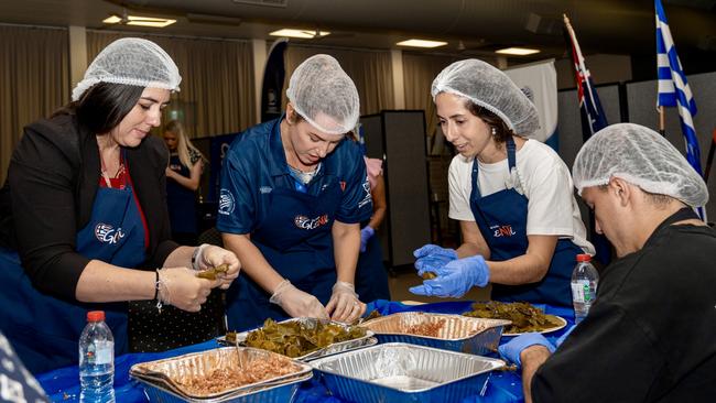 Chief Minister Lia Finocchiaro gets stuck into helping make Dolmades for the 2025 Greek Glenti