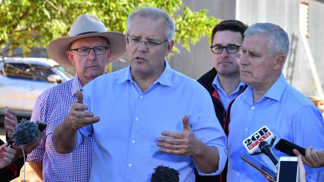 Prime Minister Scott Morrison, Deputy Prime Minister Michael McCormack and Minister for Agriculture David Littleproud while visiting Eumungerie Farm, NSW, last month. Picture: Mick Tsikas