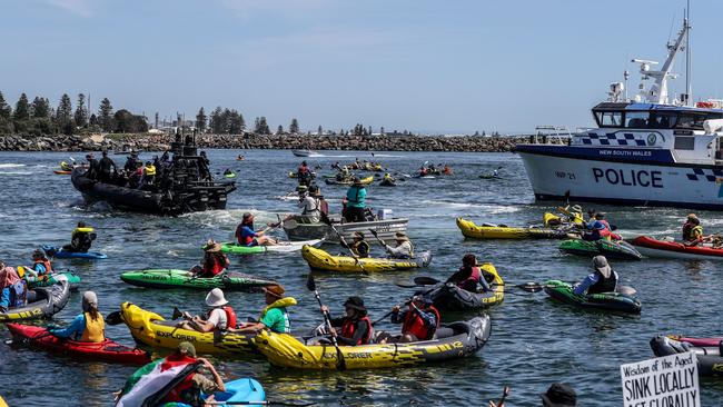 Climate protesters in kayaks attempt to block access to the Newcastle coal port in November. Picture: Getty