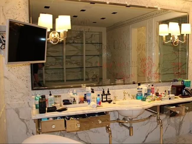 Messages were scrawled on the bathroom mirror in lipstick. Picture: US Department of Justice