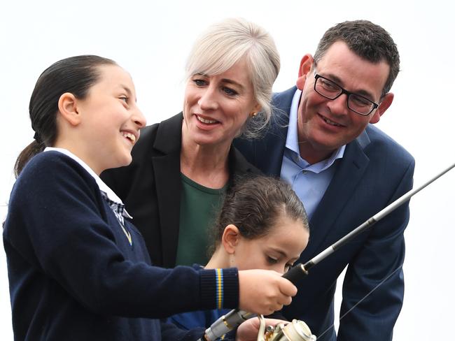 Catherine Andrews (2nd left), and Victorian Premier Daniel Andrews (2nd right) are seen at the Mordialloc Pier, Melbourne, Wednesday, October 31, 2018. The Premier announced that a re-elected Andrews Government will improve boating and fishing regulations and licensing across Victoria. (AAP Image/James Ross) NO ARCHIVING