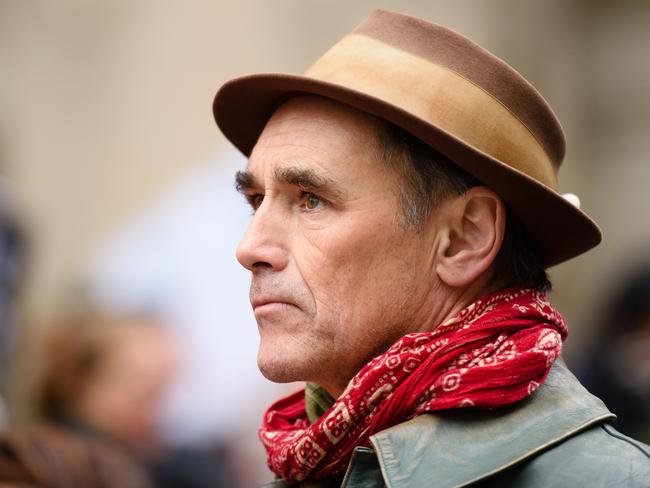British actor Mark Rylance attends a protest outside the entrance to Downing Street in central London on November 28, 2015, against the British government's proposed involvement in air strikes against the Islamic State (IS) group in Syria. Thousands of people were expected to protest in London Saturday against Britain potentially joining air strikes against the Islamic State (IS) group in Syria. Parliament is expected to vote on the issue next week after Prime Minister David Cameron pushed MPs to back the move in the wake of this month's Paris attacks. AFP PHOTO / LEON NEAL