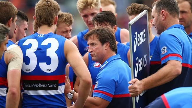 Luke Beveridge talking to his players during the horror loss to GWS. Picture: Getty Images