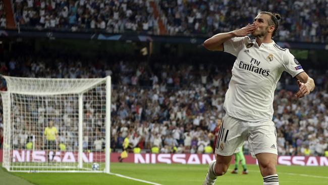 Real midfielder Gareth Bale celebrates after scoring his side's second goal during a Group G Champions League soccer match between Real Madrid and Roma. Picture: AP Photo