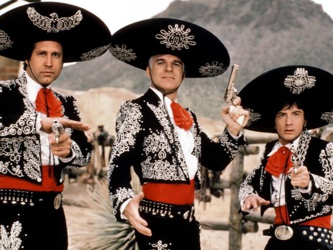 Martin, centre, and Short, right, with Chevy Chase in a scene from The Three Amigos.