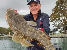 Fisherman Ryan Parsons, 50, caught an 82cm flathead in Tweed on November 26, 2023. Picture: Supplied.