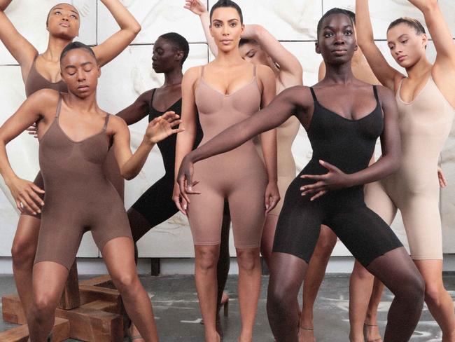 Kim Kardashian, centre, with models wearing SKIMS. Picture: SKIMS