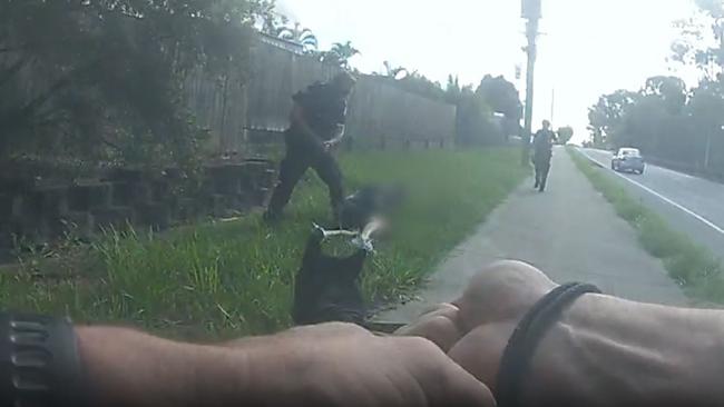 Police officers make an arrest during Operation Whiskey Legion in Ipswich.