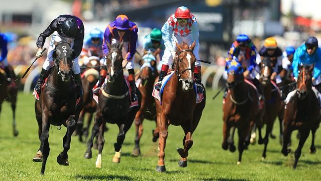 Damien Oliver wins the Melbourne Cup on Fiorente (left) with Ruscello nowhere in sight. Picture: Mark Evans