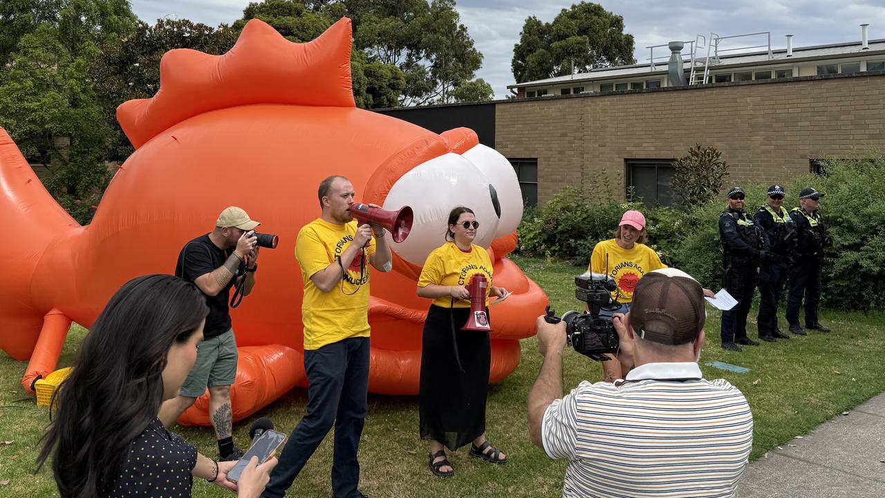 Protesters from Solutions for Climate Australia were seen outside the rally location. Picture: NewsWire/ Ryan Bourke