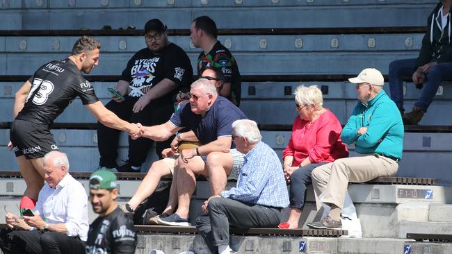 Sam Burgess meets supporters at Redfern Oval on Friday. Picture: John Grainger