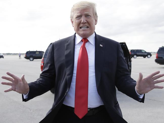 President Donald Trump boards Air Force One, Sunday, March 24, 2019, at Palm Beach International Airport, in West Palm Beach, Fla., en route to Washington. (AP Photo/Carolyn Kaster)