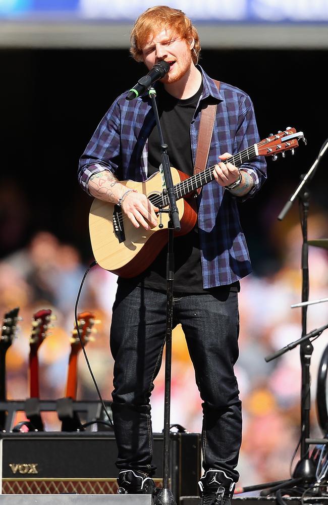 Hectic schedule ... Ed Sheeran performs at the 2014 AFL Grand Final. Picture: Getty