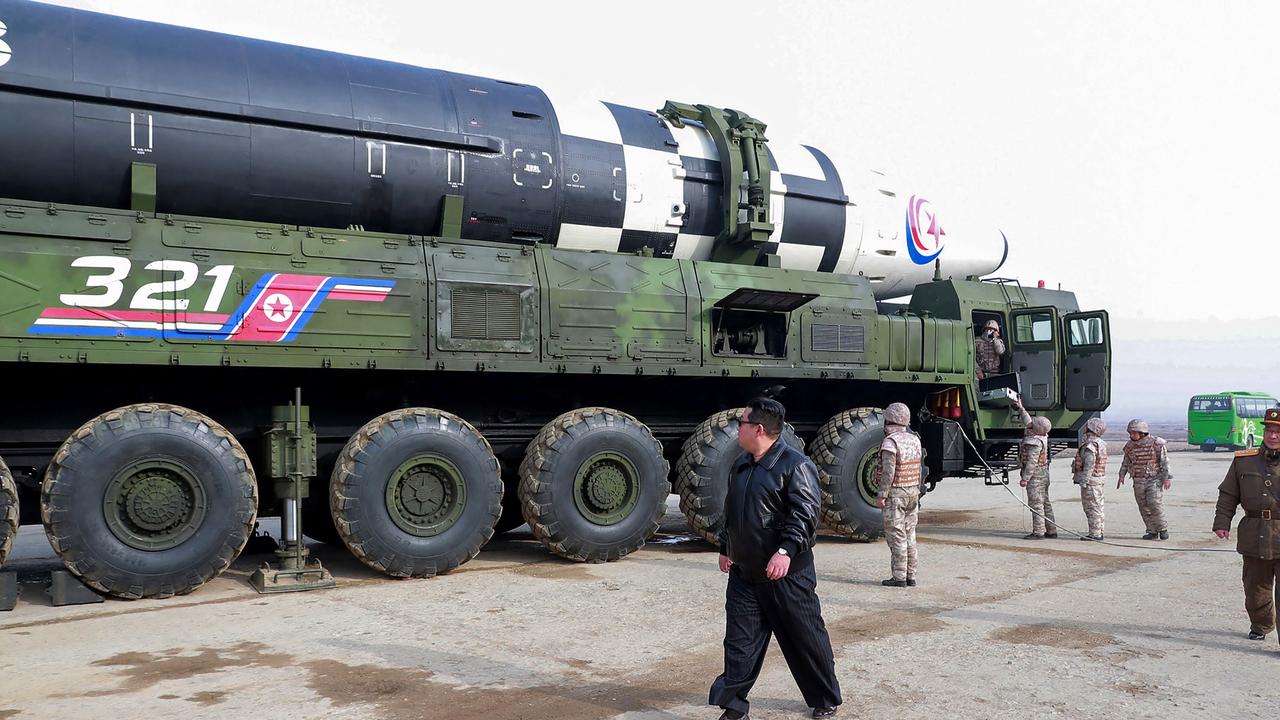 Kim inspects the intercontinental ballistic missile before its launch at an undisclosed location in North Korea. Picture: AFP/KCNA via KNS