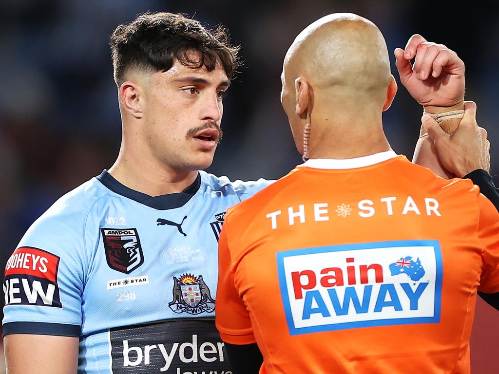 Kotoni Staggs receives attention for a shoulder cork during Origin I, cutting short his NSW debut and giving the Broncos a headache. Picture: Mark Kolbe/Getty Images