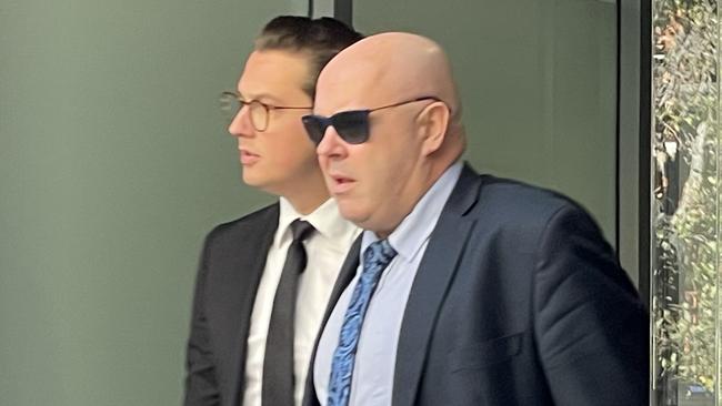 Highland Property real estate agent Cameron Miller (left) outside court. Picture: Ashleigh Tullis